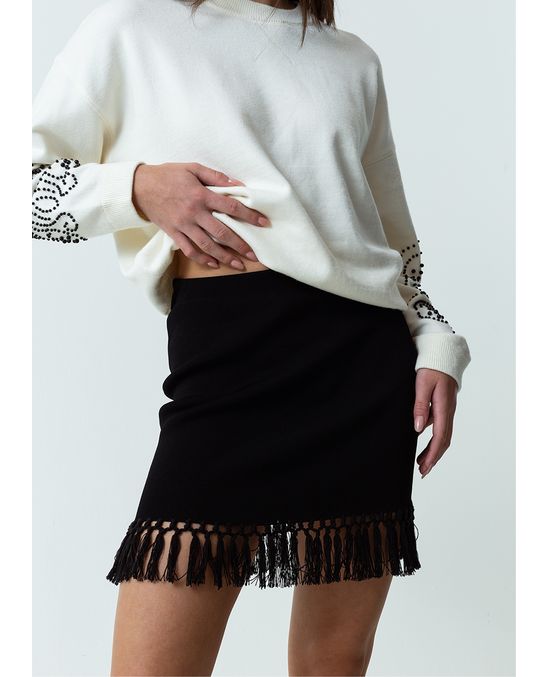 Falda corta con borlas en ruedo