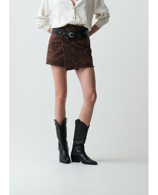 Falda corta tipo animal print