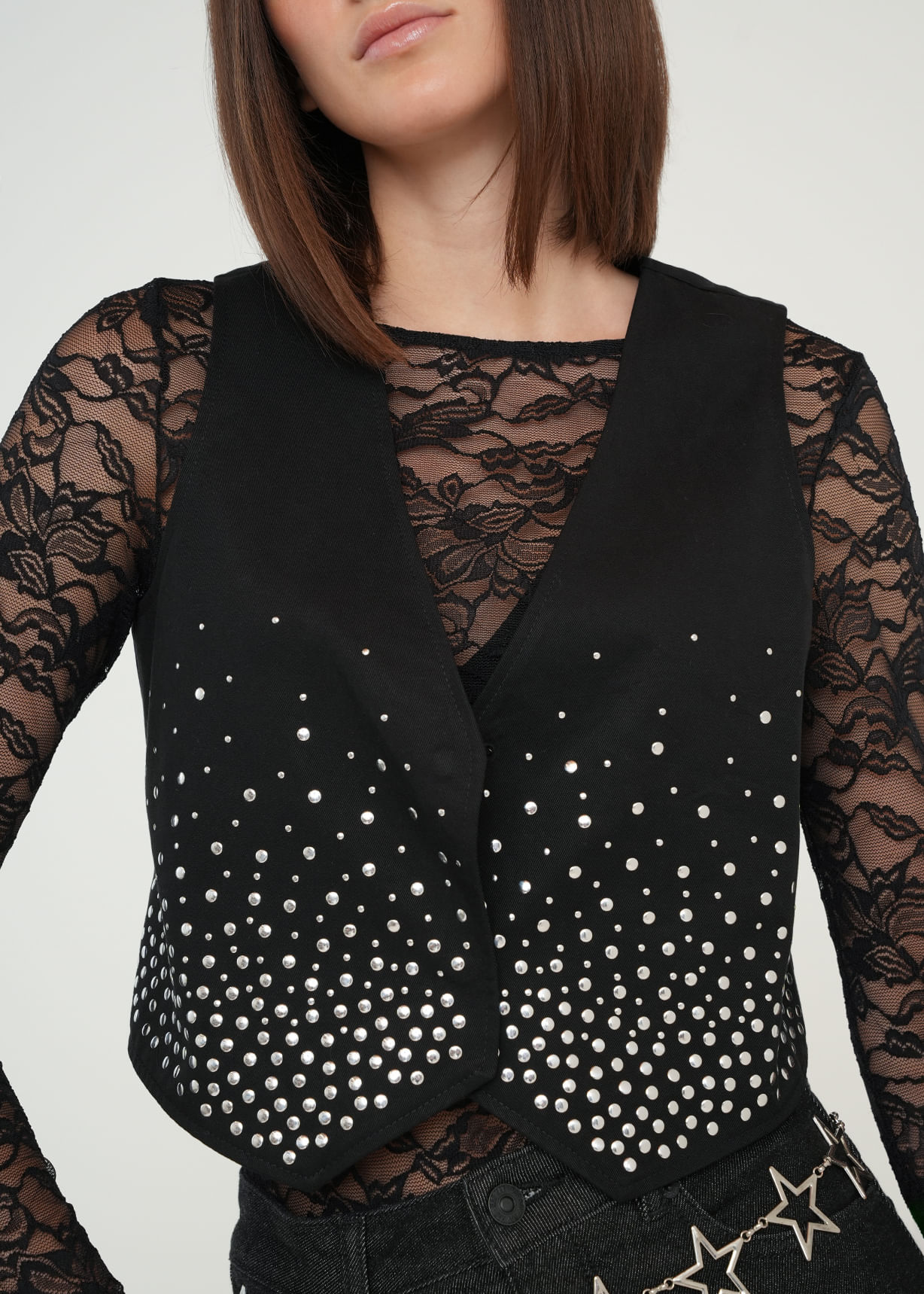 Chaleco con apliques brillantes